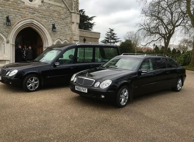 funeral vehicles parked