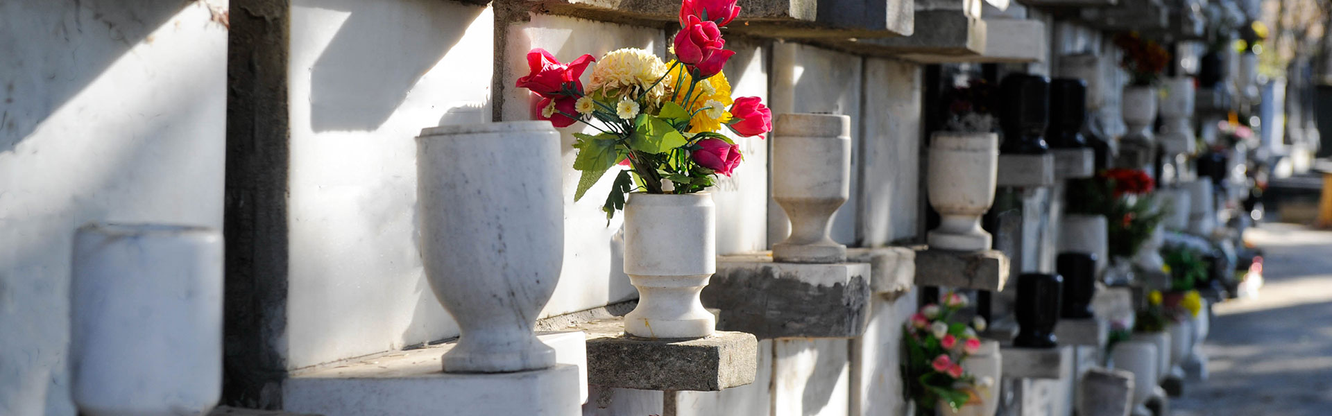 cemetery with flowers in a vase