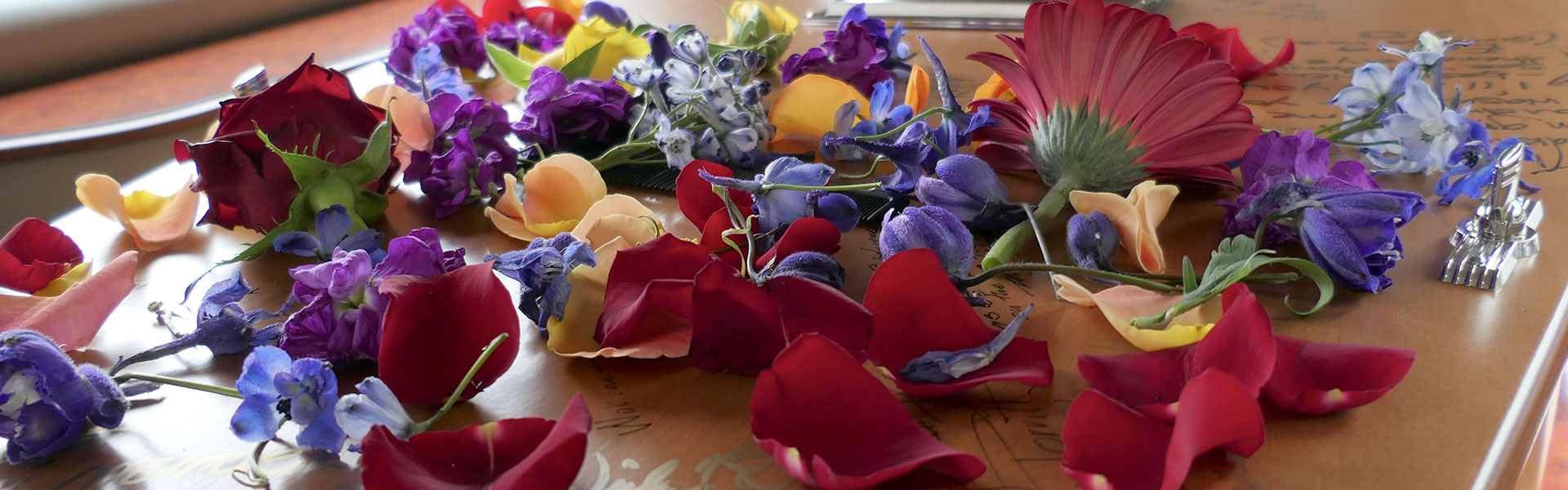 flowers on top of a coffin